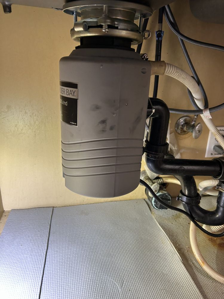 Glacier Bay garbage disposal installed with proper drainage